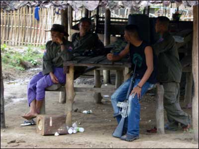 Karen National Union resistance fighters take a break from training at Karen National Union Headquarters. (Anna Sussman)
