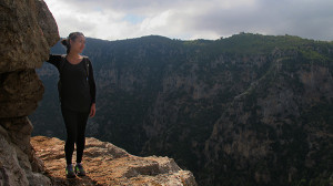 Alexis Lai standing on a mountain trail