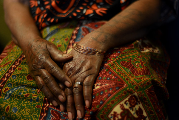 Monah Smith's hands, which she had tattooed as a young girl in Liberia