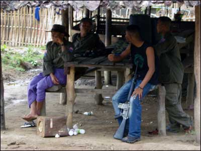 Karen National Union resistance fighters take a break from training at Karen National Union Headquarters. (Anna Sussman) Karen National Union resistance fighters take a break from training at Karen National Union Headquarters. (Anna Sussman)