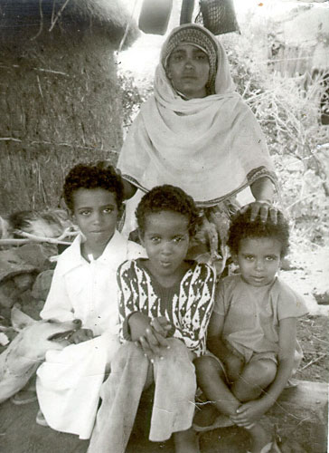 Tsege Asgedom with her children, Tewolde, Selamawi (Mawi), and Mehret