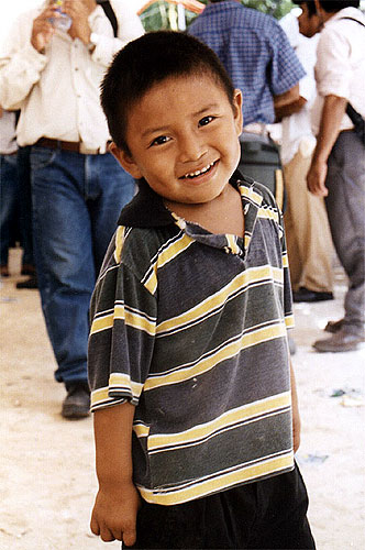 Smiling boy wearing a polo shirt