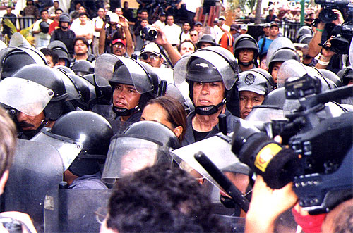 Group of police officers with riot helmets