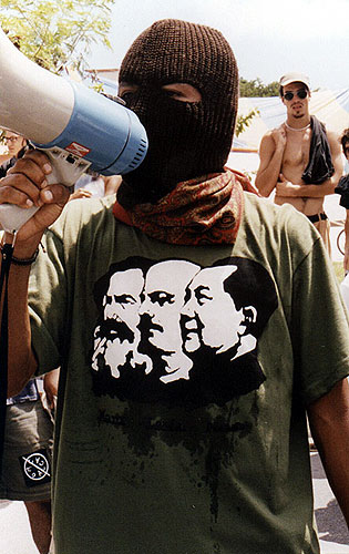 Mexican protester speaks into a bullhorn