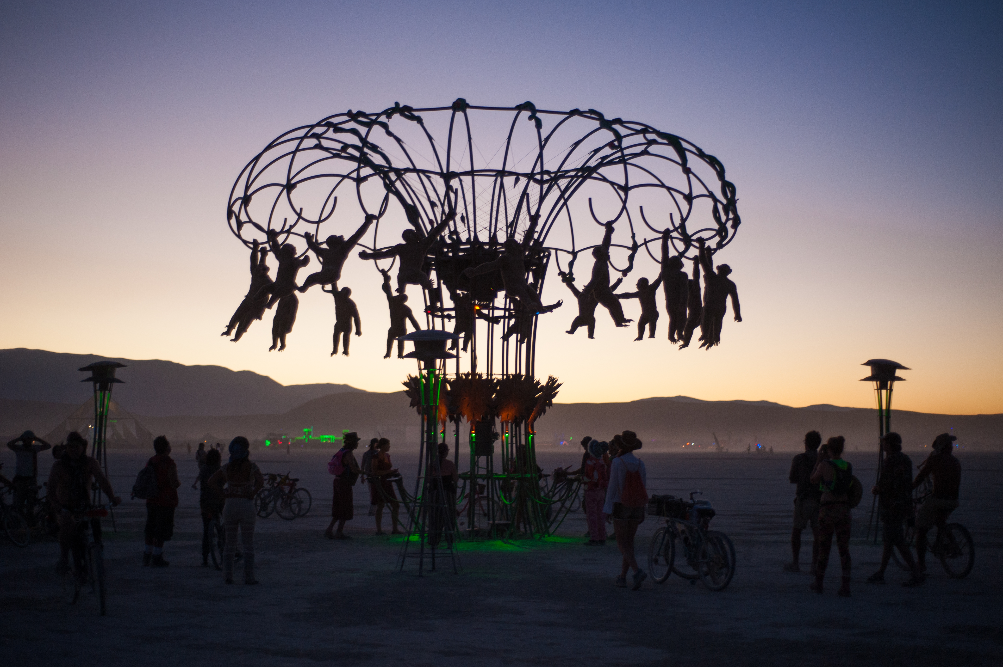 An art installation on the playa featuring spinning monkeys
