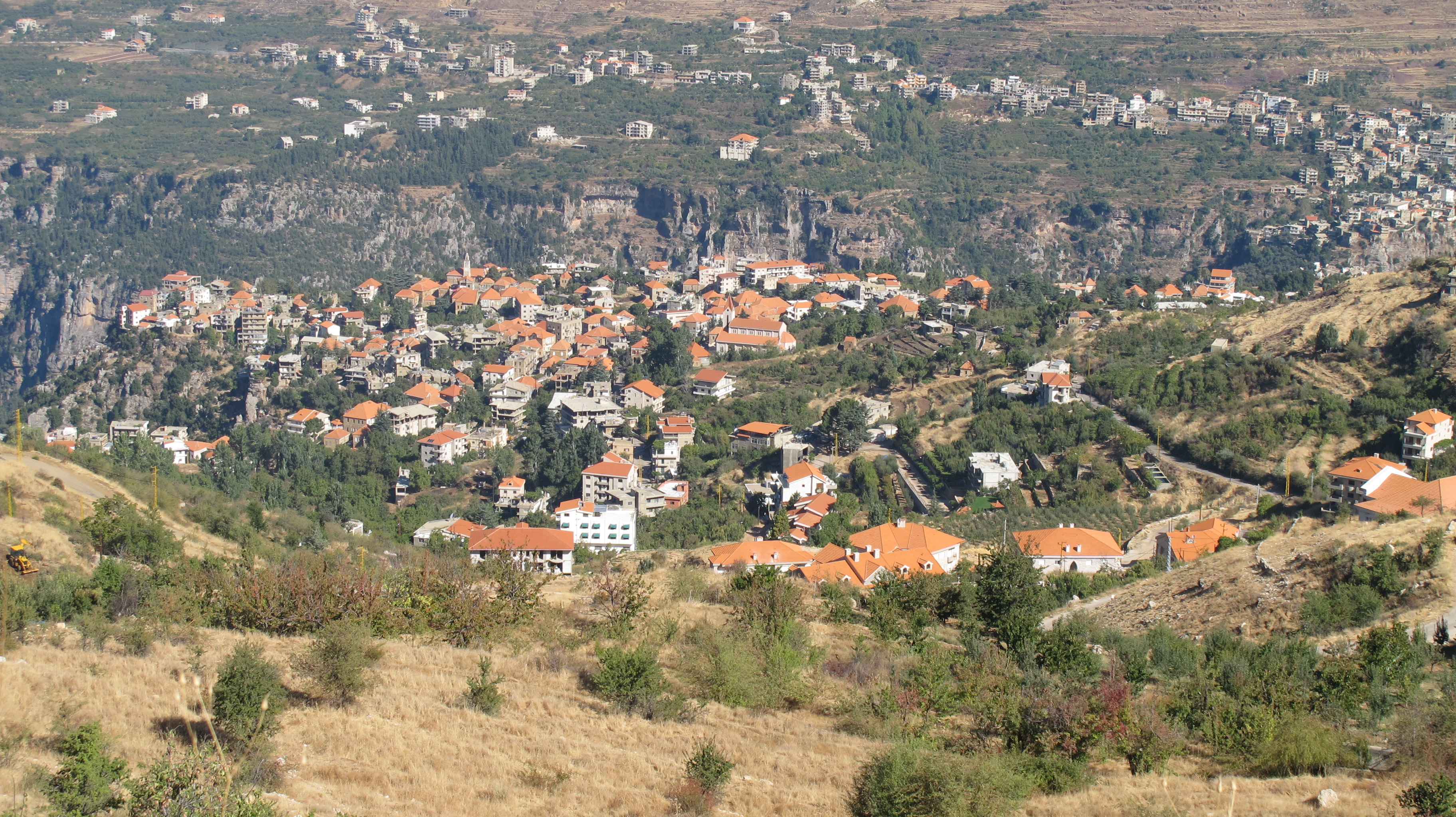 A view from high above of the red roofs of Hasroun