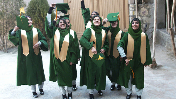 Girl graduates celebrating